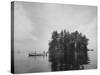 Boating on Sebago Lake Past "Keepsake" Island-Peter Stackpole-Stretched Canvas