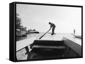 Boatman on Tonle Sap Lake, Cambodia-Walter Bibikow-Framed Stretched Canvas