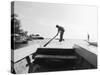 Boatman on Tonle Sap Lake, Cambodia-Walter Bibikow-Stretched Canvas