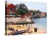 Boats and Beachgoers on the Beaches of Dakar, Senegal-Janis Miglavs-Stretched Canvas