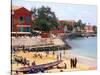 Boats and Beachgoers on the Beaches of Dakar, Senegal-Janis Miglavs-Stretched Canvas