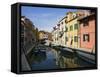 Boats and Colorful Reflections of Homes in Canal, Burano, Italy-Dennis Flaherty-Framed Stretched Canvas