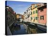 Boats and Colorful Reflections of Homes in Canal, Burano, Italy-Dennis Flaherty-Stretched Canvas