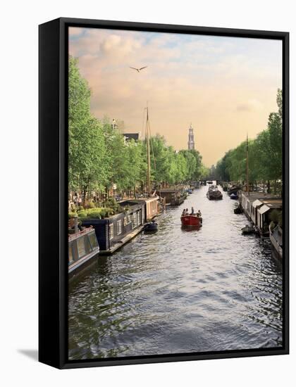 Boats Cruise Along a Canal with the Zuiderkerk Bell-Tower in the Background, Amsterdam, Netherlands-Miva Stock-Framed Stretched Canvas