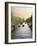 Boats Cruise Along a Canal with the Zuiderkerk Bell-Tower in the Background, Amsterdam, Netherlands-Miva Stock-Framed Photographic Print