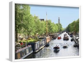 Boats Cruise Along a Canal with the Zuiderkerk Bell-Tower in the Background, Amsterdam, Netherlands-Miva Stock-Framed Photographic Print