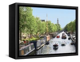 Boats Cruise Along a Canal with the Zuiderkerk Bell-Tower in the Background, Amsterdam, Netherlands-Miva Stock-Framed Stretched Canvas