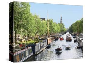 Boats Cruise Along a Canal with the Zuiderkerk Bell-Tower in the Background, Amsterdam, Netherlands-Miva Stock-Stretched Canvas