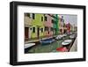 Boats Docked Along Canal with the Colorful Homes of Burano, Italy-Darrell Gulin-Framed Photographic Print