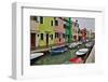 Boats Docked Along Canal with the Colorful Homes of Burano, Italy-Darrell Gulin-Framed Photographic Print