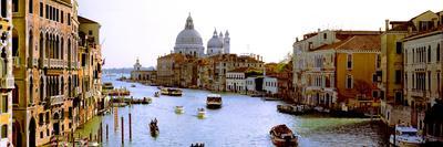https://imgc.allpostersimages.com/img/posters/boats-in-a-canal-with-a-church-in-the-background-santa-maria-della-salute-grand-canal-venice_u-L-PGCMZD0.jpg?artPerspective=n