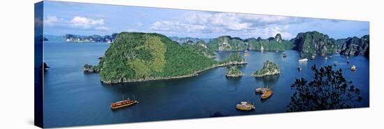 Boats in Halong Bay, Gulf of Tonkin, Vietnam-null-Stretched Canvas