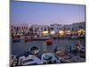 Boats in Harbour at Dusk, with Shops and Restaurants of Mykonos Town in the Background, Greece-Fraser Hall-Mounted Photographic Print