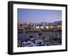 Boats in Harbour at Dusk, with Shops and Restaurants of Mykonos Town in the Background, Greece-Fraser Hall-Framed Photographic Print