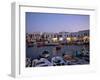 Boats in Harbour at Dusk, with Shops and Restaurants of Mykonos Town in the Background, Greece-Fraser Hall-Framed Photographic Print