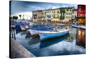 Boats In Lazise Harbor After Sunset-George Oze-Stretched Canvas