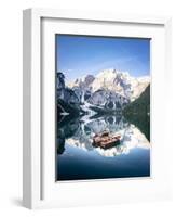 Boats moored in Lake Braies (Pragser Wildsee) with mountains reflected in water-Roberto Moiola-Framed Photographic Print