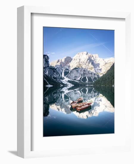 Boats moored in Lake Braies (Pragser Wildsee) with mountains reflected in water-Roberto Moiola-Framed Photographic Print