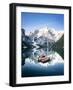 Boats moored in Lake Braies (Pragser Wildsee) with mountains reflected in water-Roberto Moiola-Framed Photographic Print