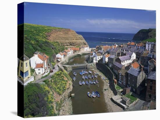 Boats Moored in the Protected Harbour of Staithes, Yorkshire, England, United Kingdom, Europe-Rainford Roy-Stretched Canvas