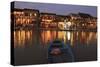 Boats moored on the Thu Bon River opposite Bach Dang Street in the old town of Hoi An, Vietnam-Paul Dymond-Stretched Canvas