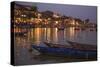 Boats moored on the Thu Bon River opposite Bach Dang Street in the old town of Hoi An, Vietnam-Paul Dymond-Stretched Canvas