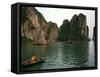 Boats Move Among the Craggy Islands of Halong Bay-null-Framed Stretched Canvas