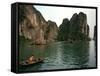 Boats Move Among the Craggy Islands of Halong Bay-null-Framed Stretched Canvas