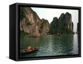 Boats Move Among the Craggy Islands of Halong Bay-null-Framed Stretched Canvas