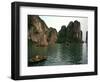 Boats Move Among the Craggy Islands of Halong Bay-null-Framed Photographic Print