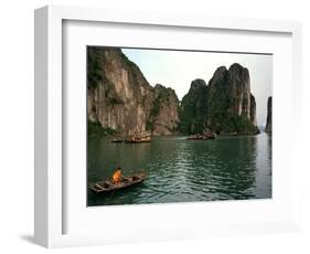 Boats Move Among the Craggy Islands of Halong Bay-null-Framed Photographic Print