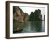 Boats Move Among the Craggy Islands of Halong Bay-null-Framed Photographic Print