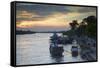 Boats on Ben Tre River at Sunset, Ben Tre, Mekong Delta, Vietnam, Indochina, Southeast Asia, Asia-Ian Trower-Framed Stretched Canvas