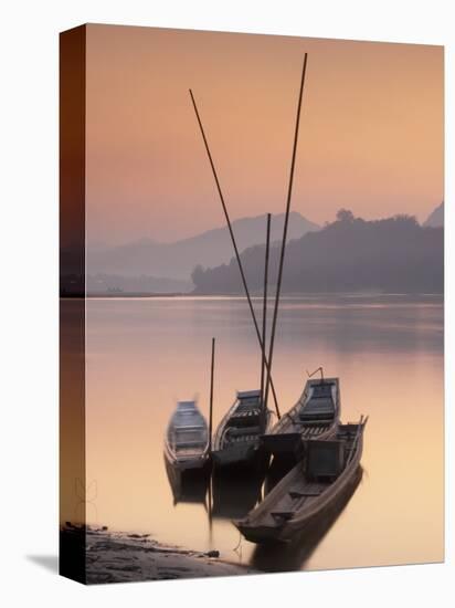 Boats on Mekong River at Sunset, Luang Prabang, Laos-Ian Trower-Stretched Canvas