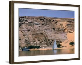 Boats on Nile River Passing Massive Statues of Pharoh Ramses II at Door to Queen Nefertari's Temple-James Burke-Framed Photographic Print