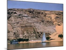 Boats on Nile River Passing Massive Statues of Pharoh Ramses II at Door to Queen Nefertari's Temple-James Burke-Mounted Photographic Print