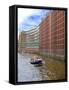 Boats Pass by Waterfront Warehouses and Lofts, Speicherstadt Warehouse District, Hamburg, Germany-Miva Stock-Framed Stretched Canvas