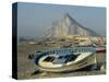 Boats Pulled onto Beach Below the Rock of Gibraltar, Gibraltar-Charles Bowman-Stretched Canvas