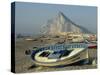 Boats Pulled onto Beach Below the Rock of Gibraltar, Gibraltar-Charles Bowman-Stretched Canvas