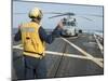 Boatswainâs Mate Signals to the Pilot of an Mh-60R Sea Hawk-null-Mounted Photographic Print