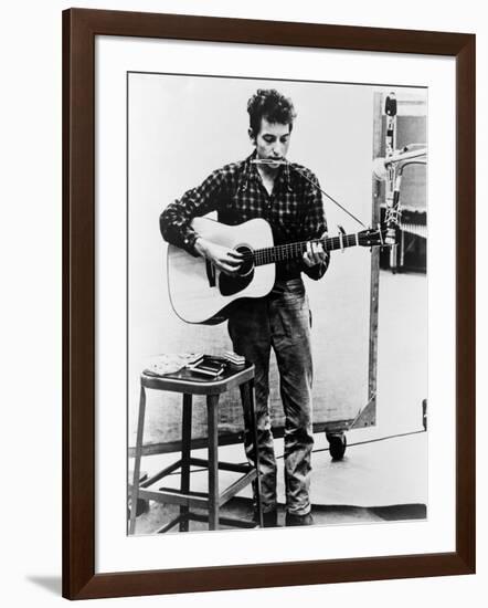 Bob Dylan Playing Guitar and Harmonica into Microphone. 1965-null-Framed Art Print