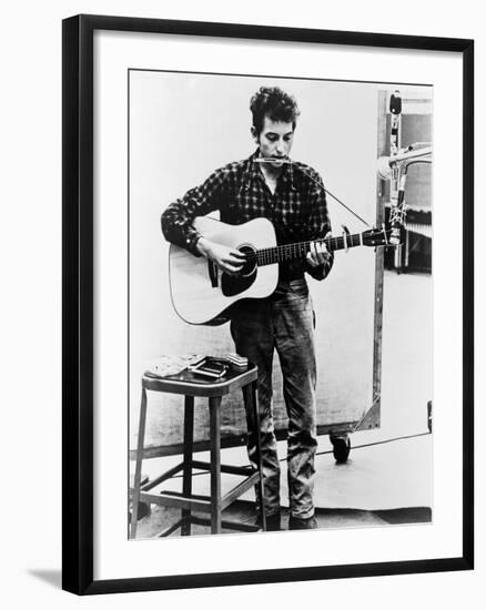 Bob Dylan Playing Guitar and Harmonica into Microphone. 1965-null-Framed Art Print