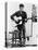 Bob Dylan Playing Guitar and Harmonica into Microphone. 1965-null-Stretched Canvas