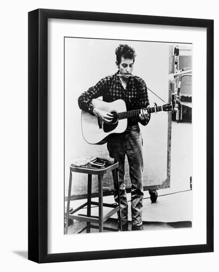 Bob Dylan Playing Guitar and Harmonica into Microphone. 1965-null-Framed Art Print