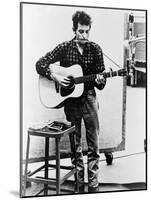 Bob Dylan Playing Guitar and Harmonica into Microphone. 1965-null-Mounted Art Print