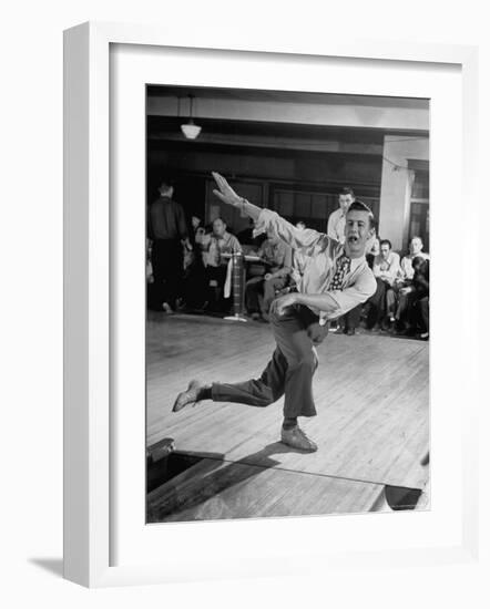 Bob Jones Bowling with a Cigar Hanging Out of His Mouth-Ralph Morse-Framed Photographic Print
