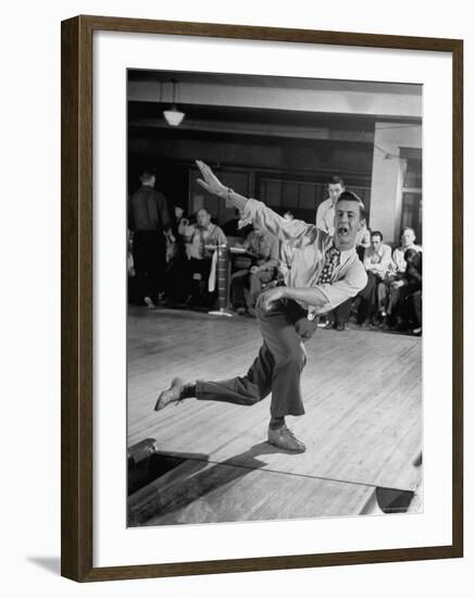 Bob Jones Bowling with a Cigar Hanging Out of His Mouth-Ralph Morse-Framed Photographic Print