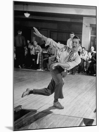 Bob Jones Bowling with a Cigar Hanging Out of His Mouth-Ralph Morse-Mounted Photographic Print