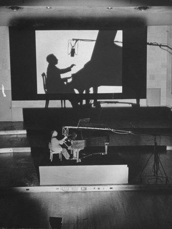 Pianist Artur Rubinstein Playing Piano for "Concerto"