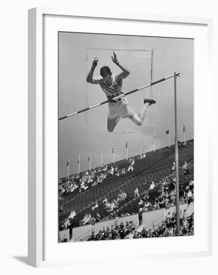 Bob Richards Competing in the High Jump at 1952 Olympics-Ralph Crane-Framed Premium Photographic Print